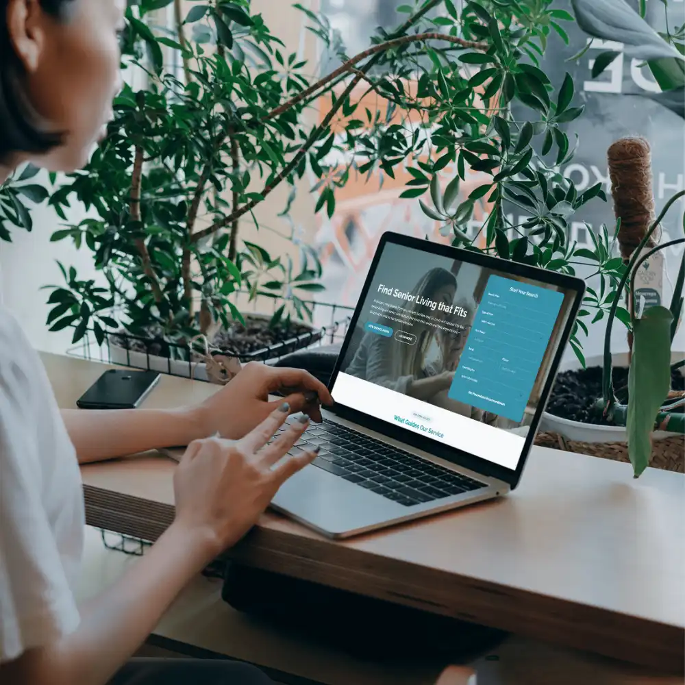 Person using the Senior Living Search Partners website to explore senior living options.